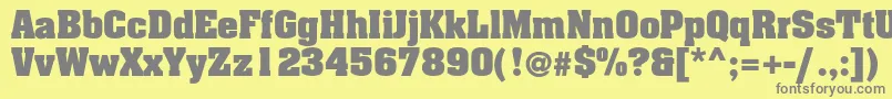 Adamantc Font – Gray Fonts on Yellow Background
