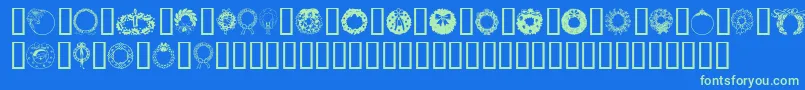 Christmaswreath2 Font – Green Fonts on Blue Background