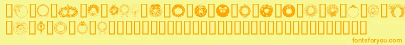 Christmaswreath2 Font – Orange Fonts on Yellow Background