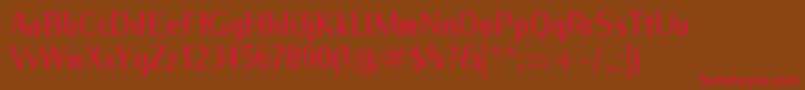 フォントIwonacondRegular – 赤い文字が茶色の背景にあります。