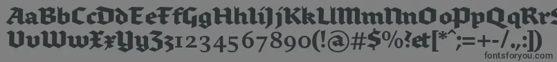 Brokenscriptbold-fontti – mustat fontit harmaalla taustalla