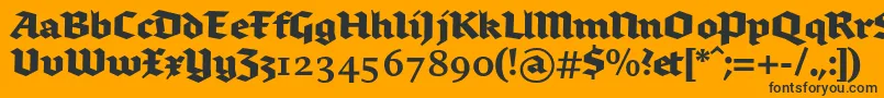 Czcionka Brokenscriptbold – czarne czcionki na pomarańczowym tle