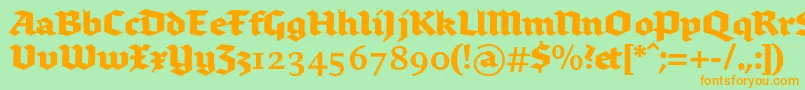 フォントBrokenscriptbold – オレンジの文字が緑の背景にあります。
