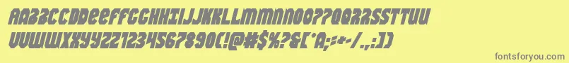 Warnationboldital-fontti – harmaat kirjasimet keltaisella taustalla