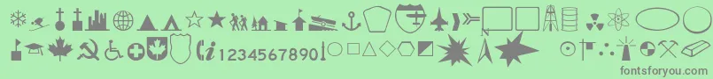 DeedaThin-Schriftart – Graue Schriften auf grünem Hintergrund