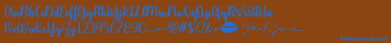 KissMeOrNotOtf Font – Blue Fonts on Brown Background