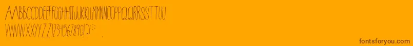 Fonte Conspiracy – fontes marrons em um fundo laranja