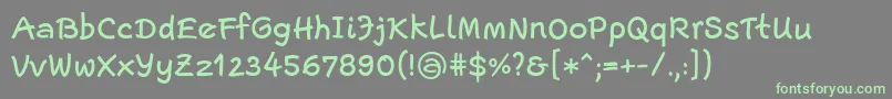 フォントEscriptLtMedium – 灰色の背景に緑のフォント