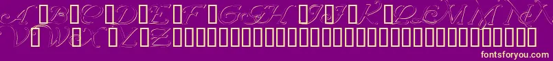 Czcionka Wrenninitialsembossed – żółte czcionki na fioletowym tle