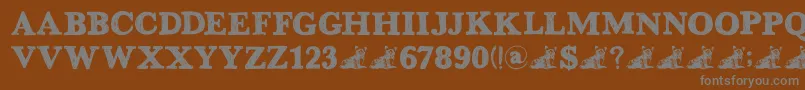 DkGreyfriars-fontti – harmaat kirjasimet ruskealla taustalla