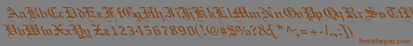 OldEnglishLefty-fontti – ruskeat fontit harmaalla taustalla