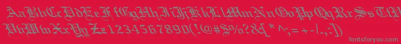 Czcionka OldEnglishLefty – szare czcionki na czerwonym tle