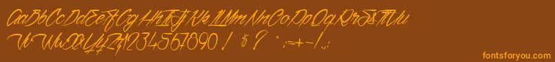 フォントVentillaStone – オレンジ色の文字が茶色の背景にあります。