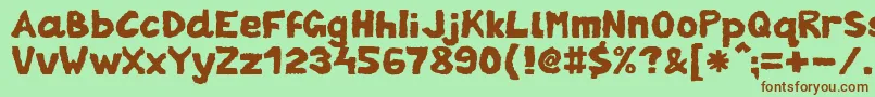 Шрифт ZaiTornpaper – коричневые шрифты на зелёном фоне
