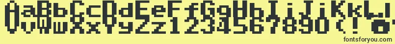 SuperMarioWorldTextBox-fontti – mustat fontit keltaisella taustalla