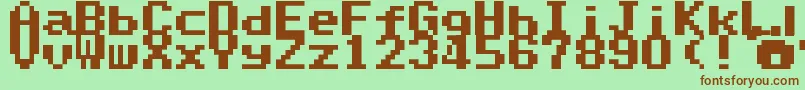 SuperMarioWorldTextBox Font – Brown Fonts on Green Background