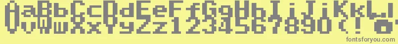 フォントSuperMarioWorldTextBox – 黄色の背景に灰色の文字