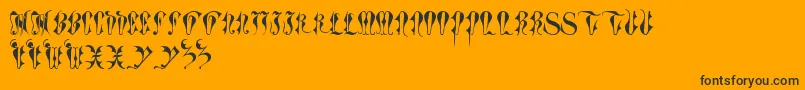 ToryGothicCaps-Schriftart – Schwarze Schriften auf orangefarbenem Hintergrund