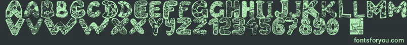 Filledabc-Schriftart – Grüne Schriften auf schwarzem Hintergrund