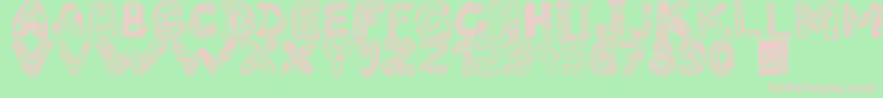 フォントFilledabc – 緑の背景にピンクのフォント