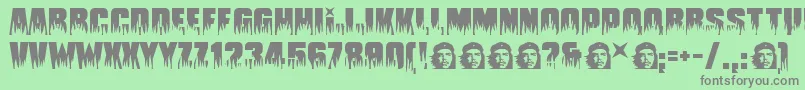 フォントGuevara – 緑の背景に灰色の文字