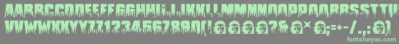 Guevara Font – Green Fonts on Gray Background
