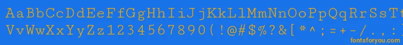 Шрифт CutivemonoRegular – оранжевые шрифты на синем фоне