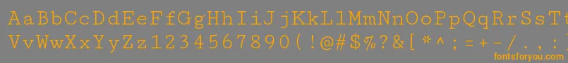 フォントCutivemonoRegular – オレンジの文字は灰色の背景にあります。