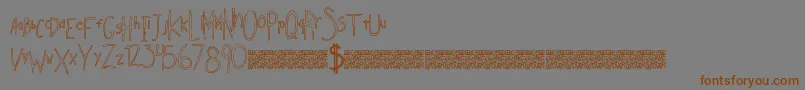 フォントIndiesellout – 茶色の文字が灰色の背景にあります。