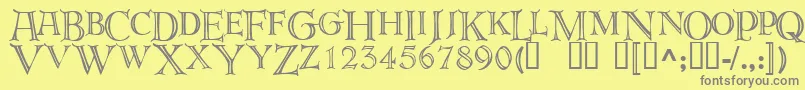 フォントDeroos – 黄色の背景に灰色の文字