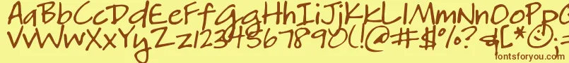 フォントDjbHeatherg – 茶色の文字が黄色の背景にあります。