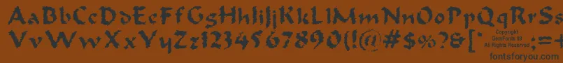 フォントOldoak – 黒い文字が茶色の背景にあります