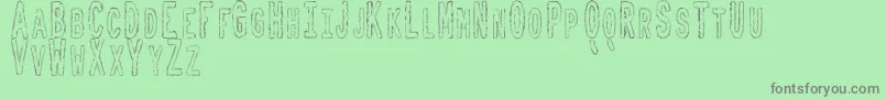 ToxicWasteTfb Font – Gray Fonts on Green Background