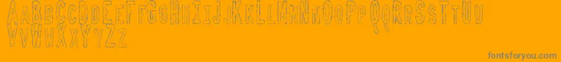 ToxicWasteTfb Font – Gray Fonts on Orange Background