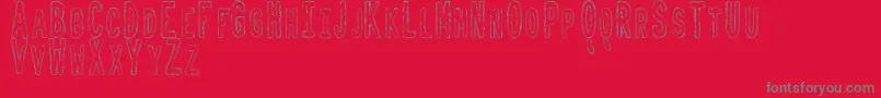 ToxicWasteTfb Font – Gray Fonts on Red Background