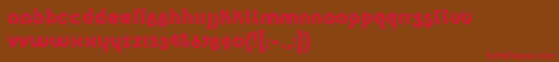 フォントK22Plural – 赤い文字が茶色の背景にあります。