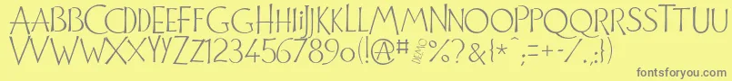 フォントCuivrerieDemo – 黄色の背景に灰色の文字