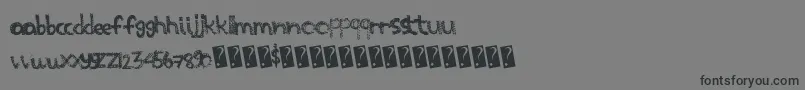 フォントScratchthis – 黒い文字の灰色の背景