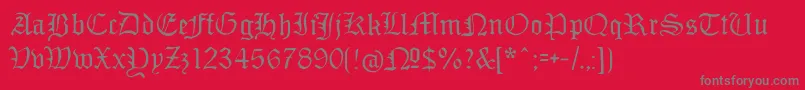 フォントMonamourfrakturregular – 赤い背景に灰色の文字