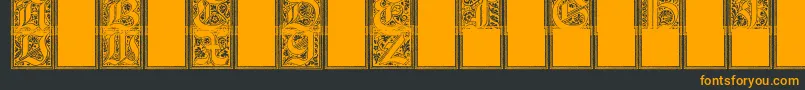 Шрифт Camelot – оранжевые шрифты на чёрном фоне