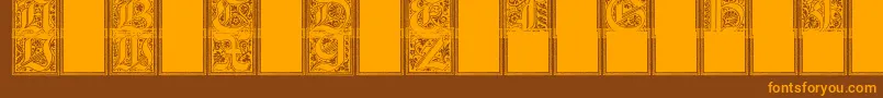 Camelot-Schriftart – Orangefarbene Schriften auf braunem Hintergrund