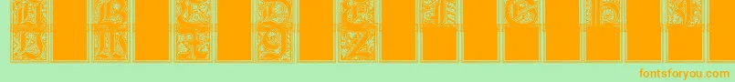 Camelot Font – Orange Fonts on Green Background