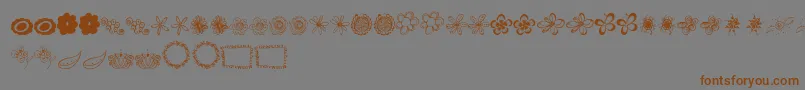 More about MtfFlowerDoodles Font MtfFlowerDoodles Font – Brown Fonts on Gray Background