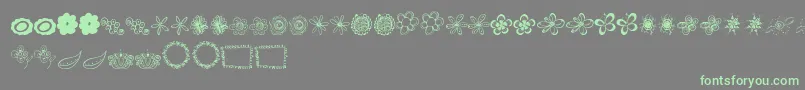 Fonte MtfFlowerDoodles – fontes verdes em um fundo cinza