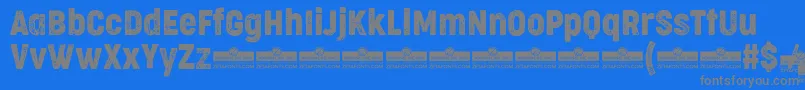 CocogooseCondensedLetterpressTrial-Schriftart – Graue Schriften auf blauem Hintergrund