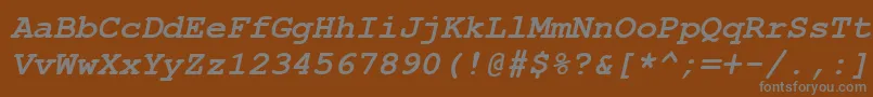 Więcej informacji o czcionce Courbi0 Czcionka Courbi0 – szare czcionki na brązowym tle