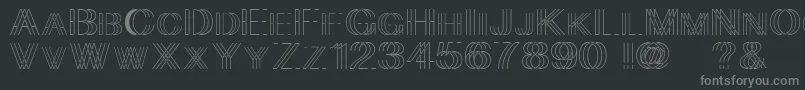 Skygge-fontti – harmaat kirjasimet mustalla taustalla