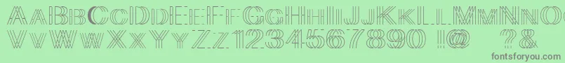 Skygge-Schriftart – Graue Schriften auf grünem Hintergrund