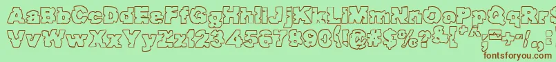 Raptorattack Font – Brown Fonts on Green Background