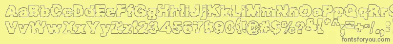 Raptorattack-Schriftart – Graue Schriften auf gelbem Hintergrund